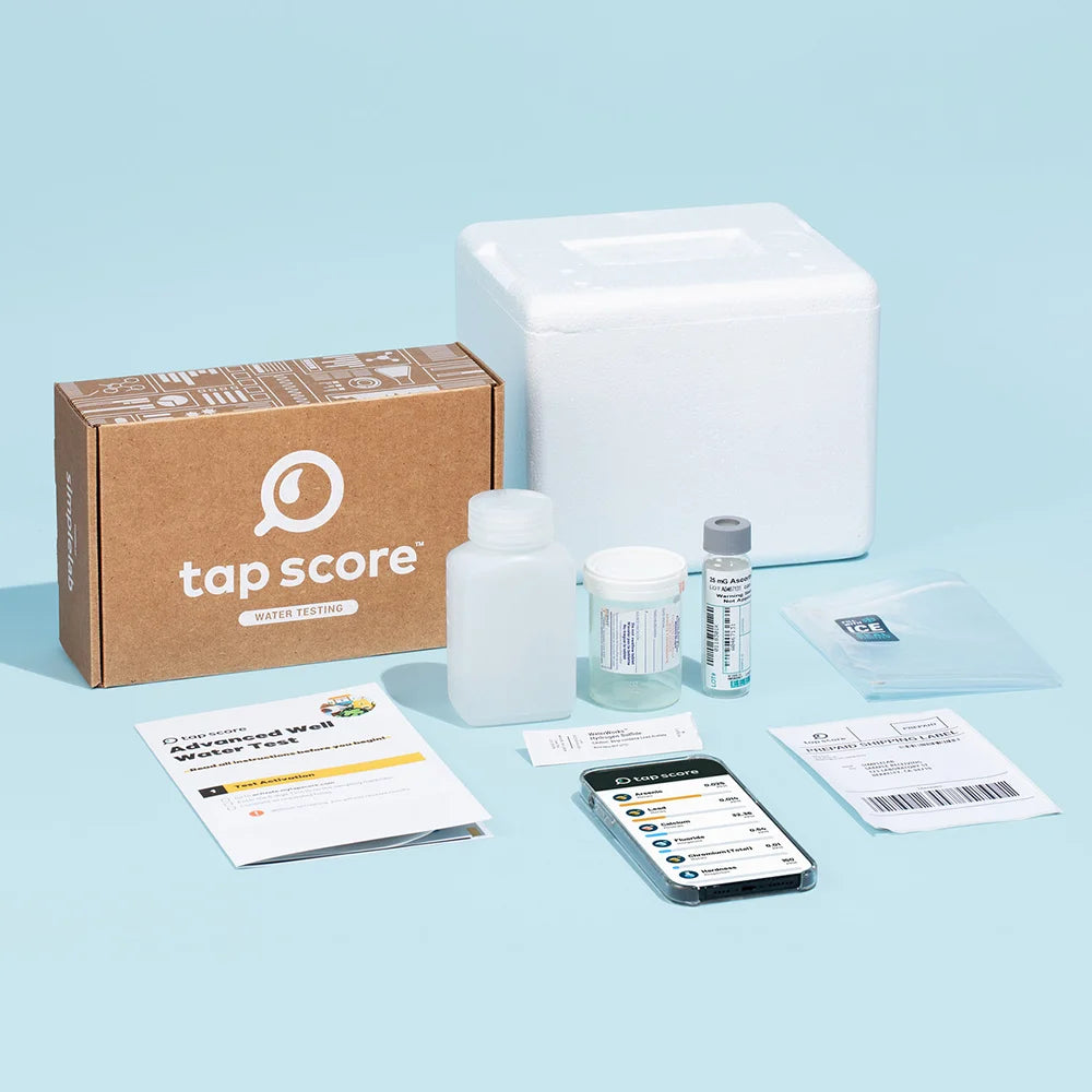 Tap Score Advanced Well Water Test kit contents — sample bottles, instructions, prepaid shipping label