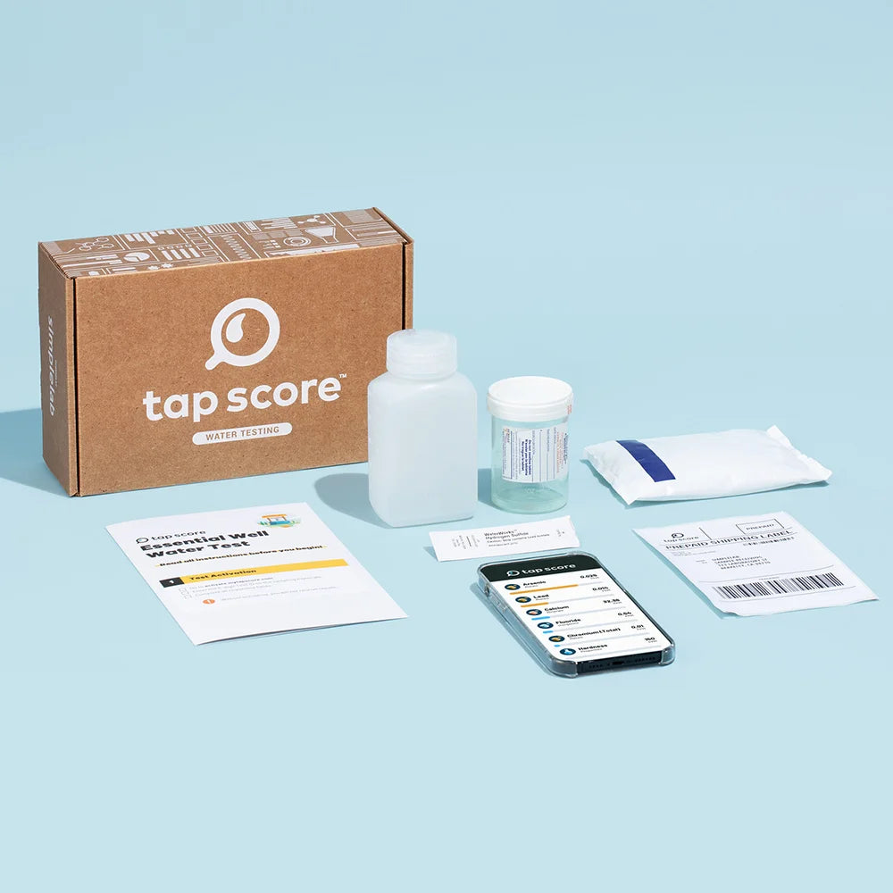 Tap Score Essential Well Water Test kit contents — sample bottles, instructions, prepaid shipping label